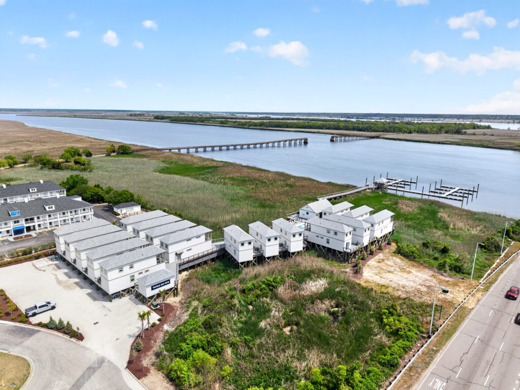 Aerial view of Winyah Bay Club townhomes along the marsh and waterway in Georgetown, SC