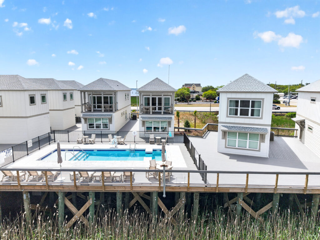 Winyah Bay Club townhomes with shared swimming pool and decks