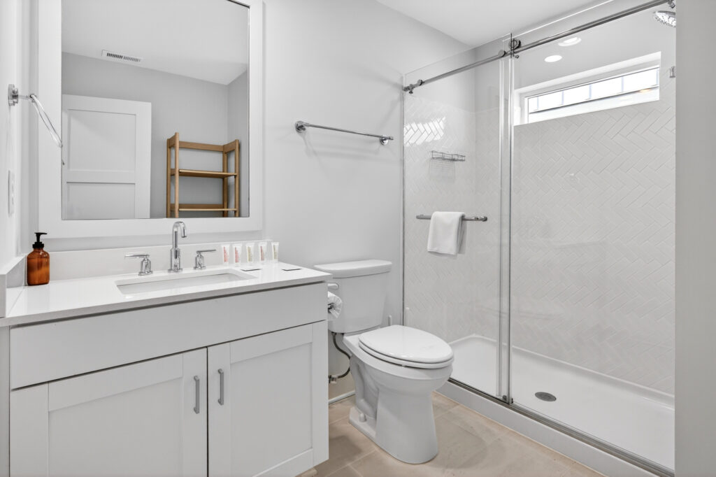 Winyah Bay Club bathroom with vanity and wood shelf