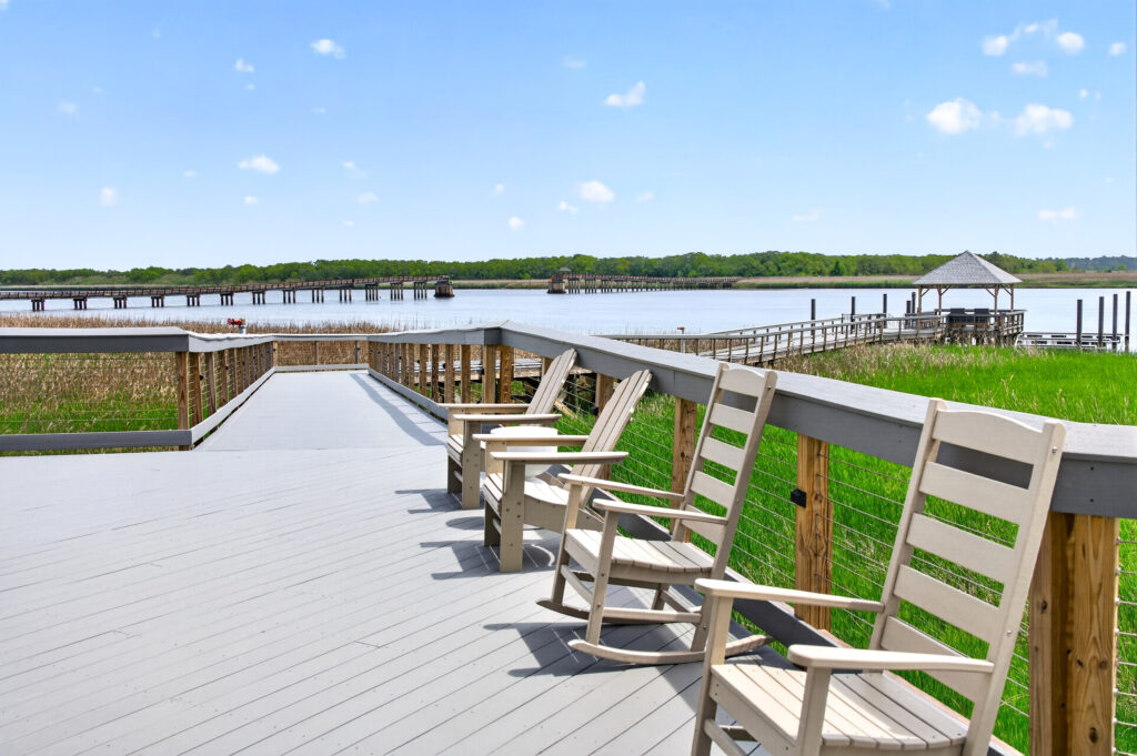 Winyah Bay Club boardwalk deck with chairs overlooking the marsh