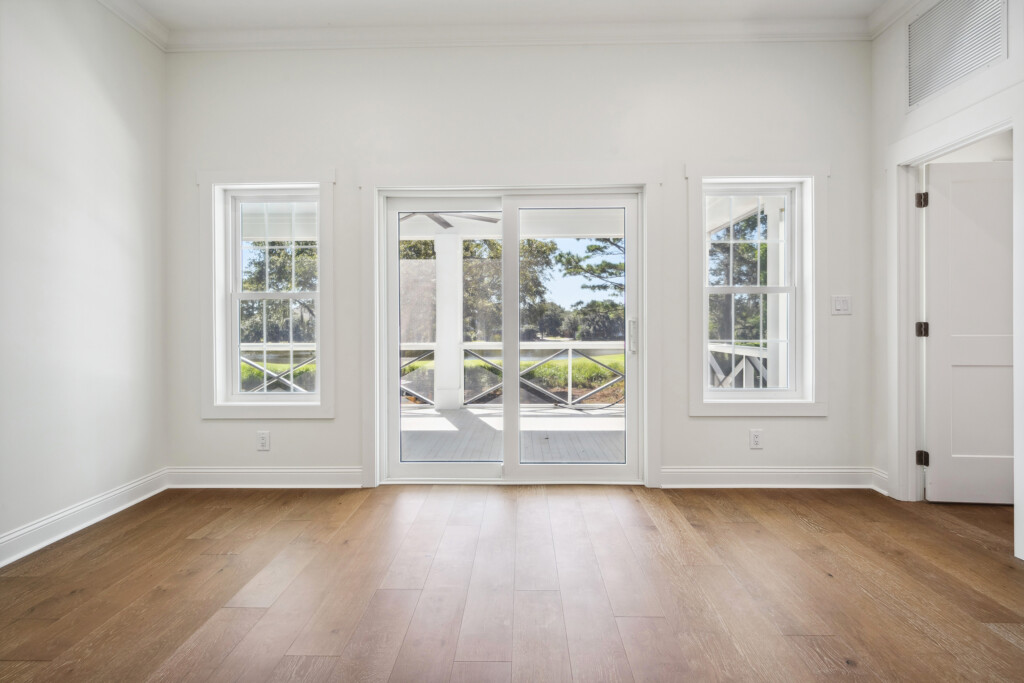 Collins Meadows room with French doors and wood flooring