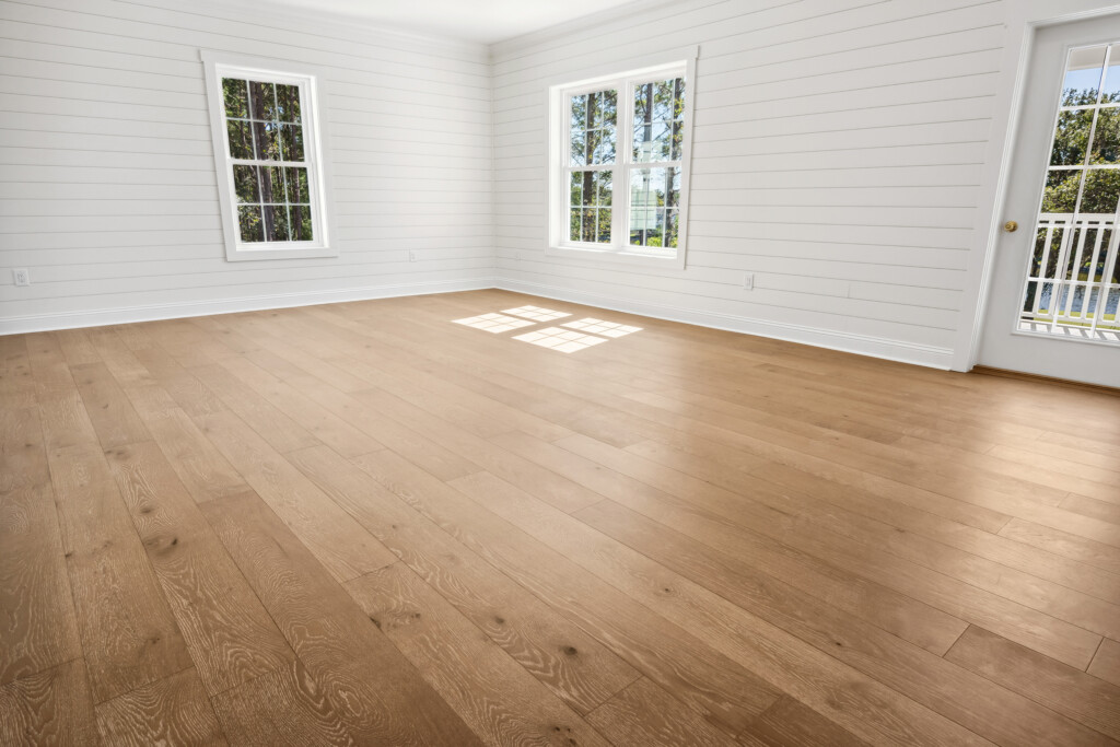 Collins Meadows room with light wood plank flooring in natural light, installed by J&S Flooring