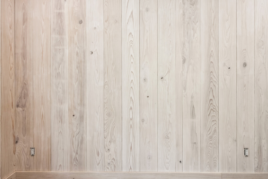Close-up of light whitewashed wood planks at Collins Meadows