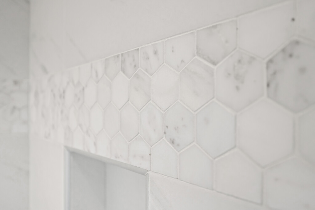 Close-up of hexagon marble-look wall tile at Collins Meadows
