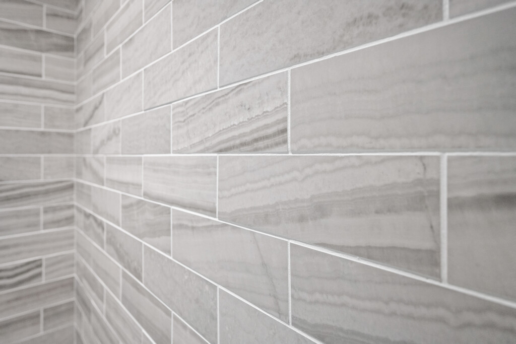 Close-up of gray linear stone-look tile at Collins Meadows
