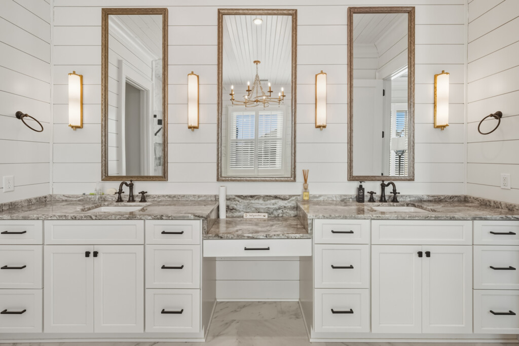 DeBordieu bathroom with double vanity and framed mirrors