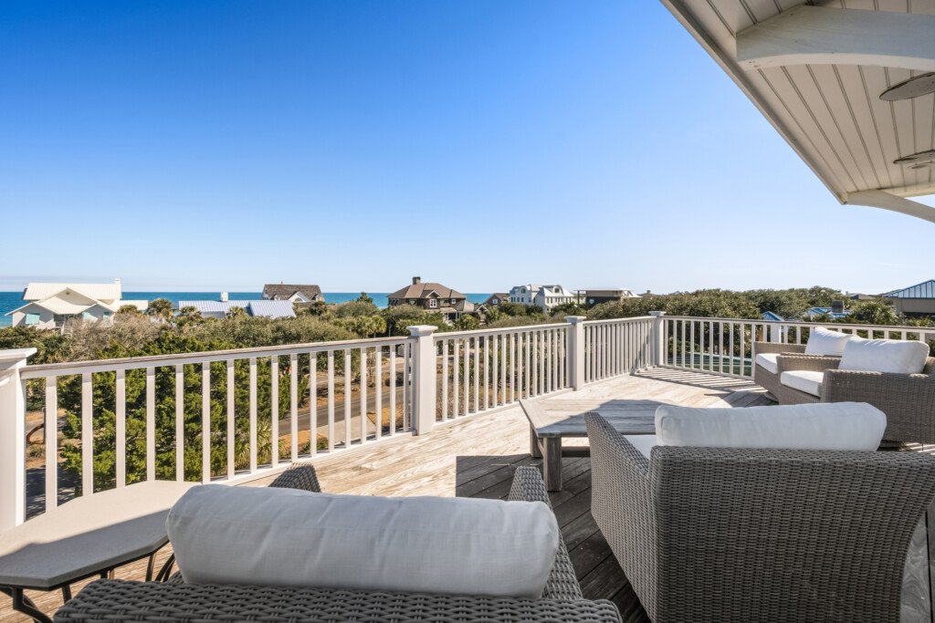 Deck at DeBordieu home with ocean view and white railing