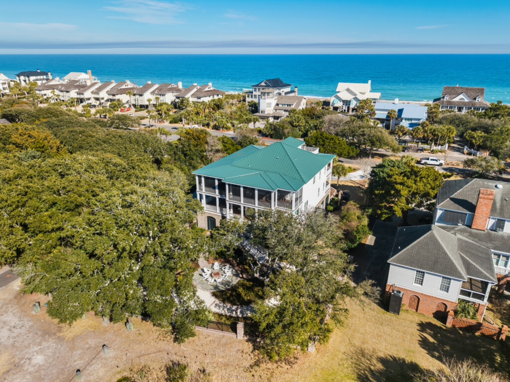 Aerial view of DeBordieu custom home and surrounding neighborhood