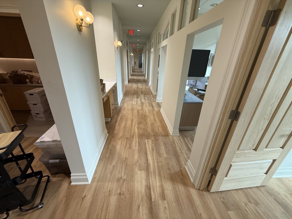 Winyah Dental Group hallway with wood-look plank flooring installed by J&S Flooring