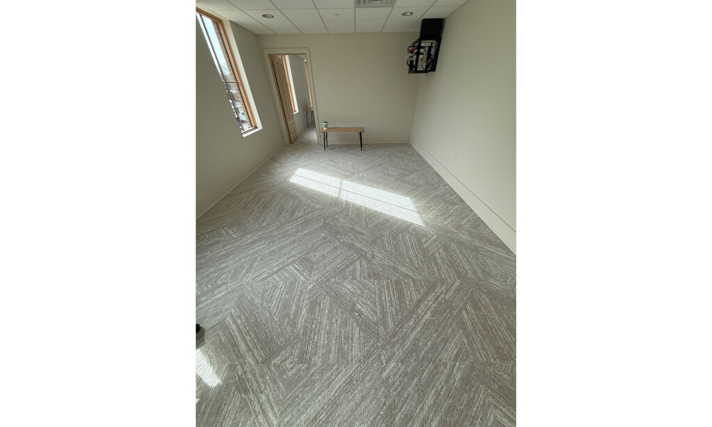 Empty office at Winyah Dental Group with patterned gray carpet tile