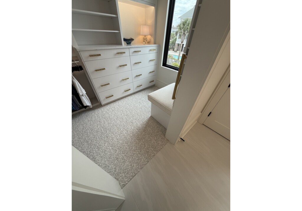 Woodward Project closet with white dresser and neutral carpet