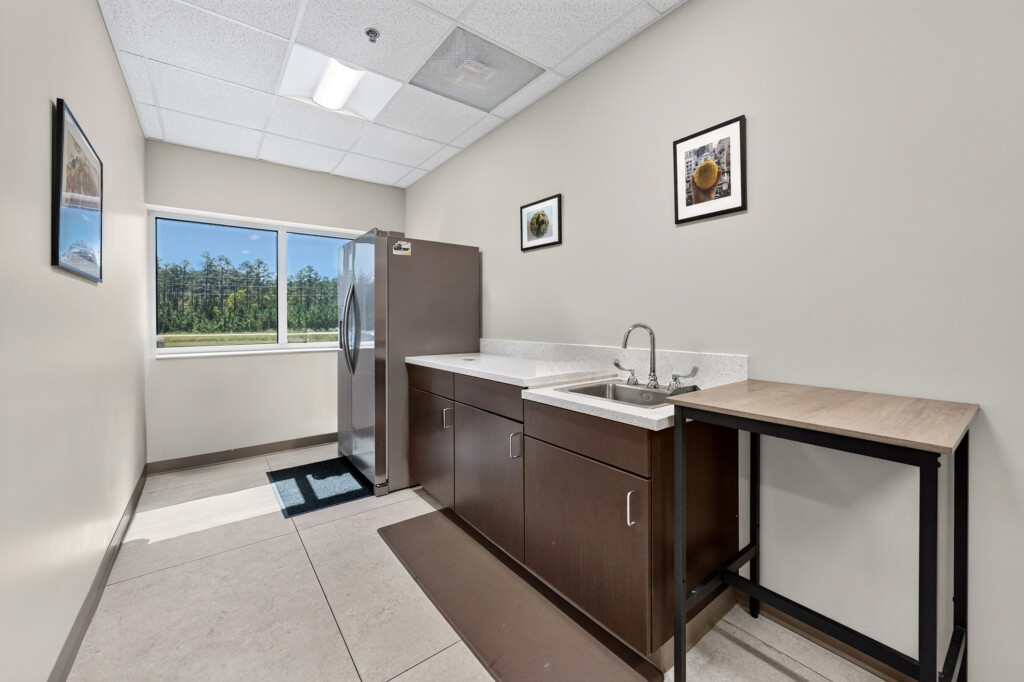 Zilmet USA break room with kitchenette and large-format porcelain floor tile