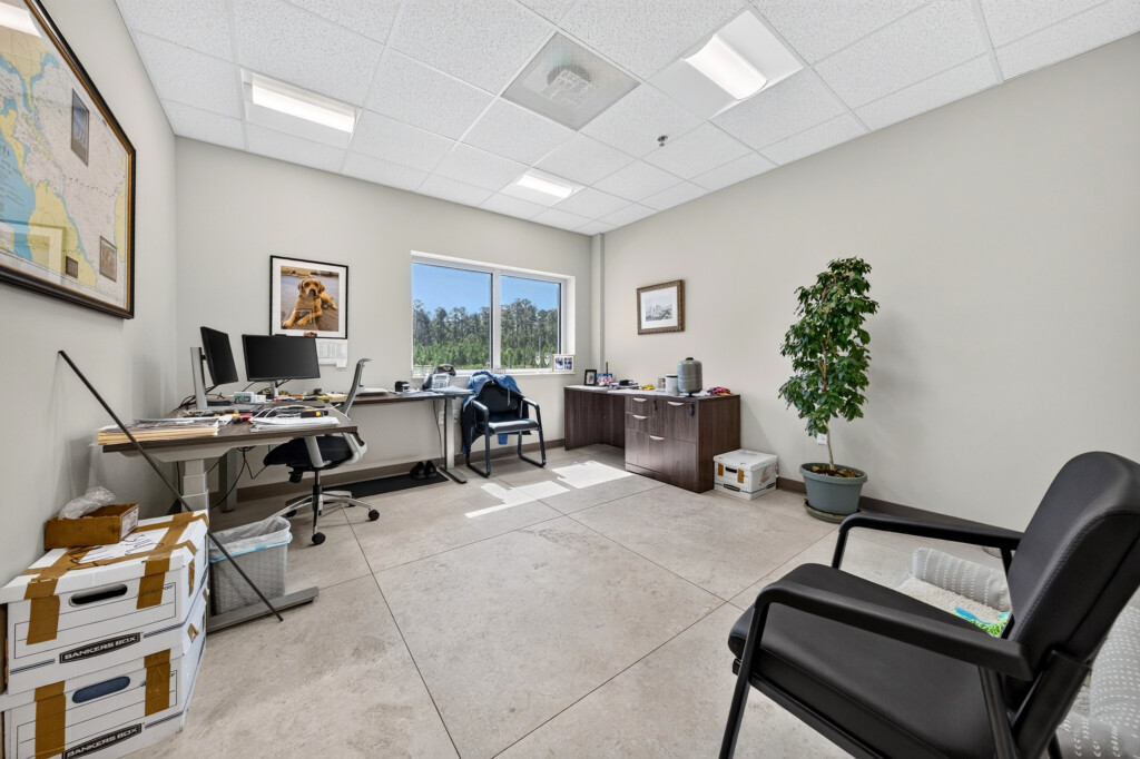 Private office at Zilmet USA with large-format porcelain floor tile