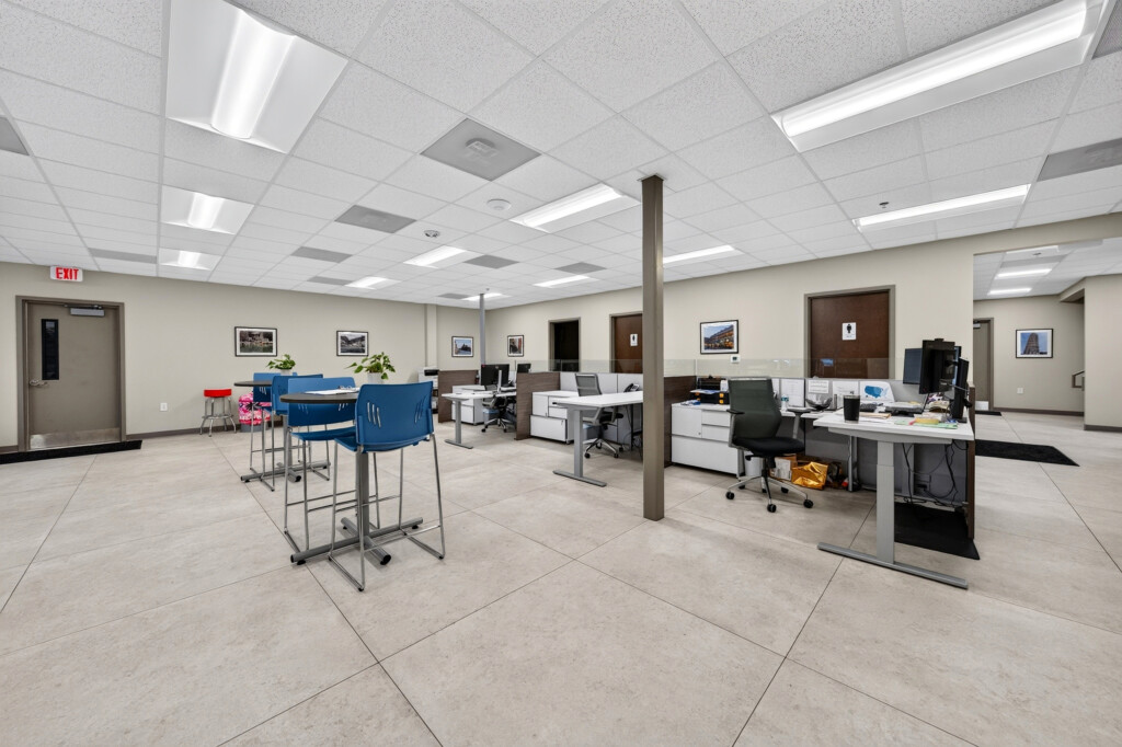 Zilmet USA open office with blue chairs and porcelain tile flooring