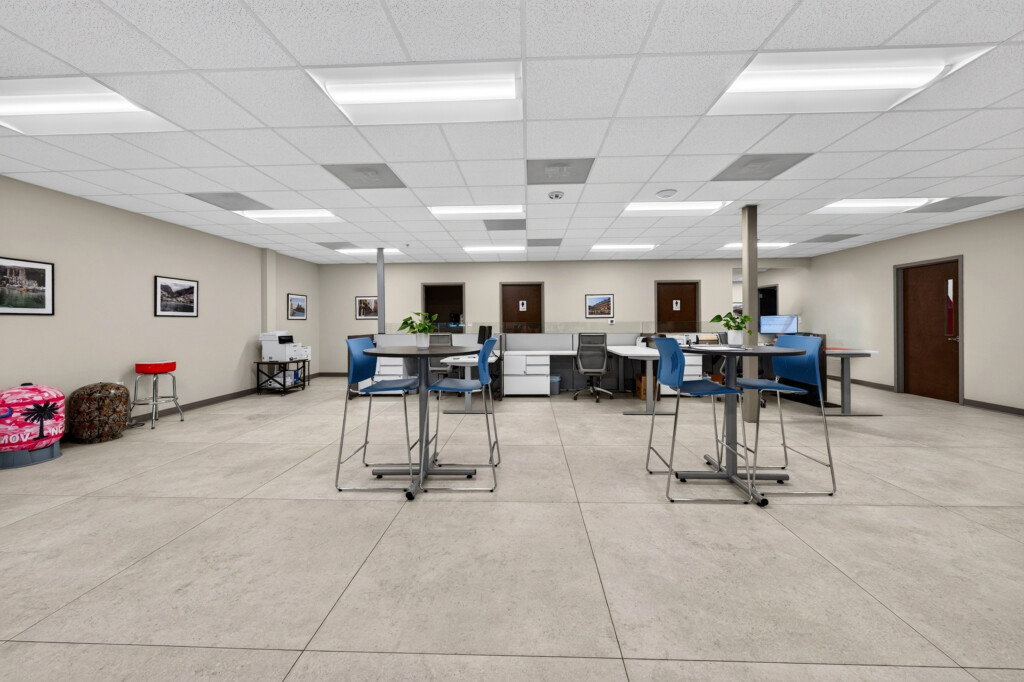 Collaborative work area at Zilmet USA with porcelain tile flooring