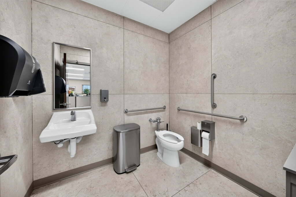 Zilmet USA restroom with large-format porcelain tile walls and floor